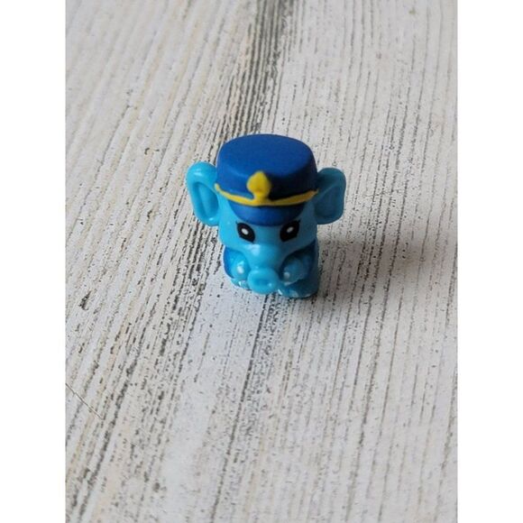 Miniature rubber elephant train conductor toy figure - Picture 1 of 4